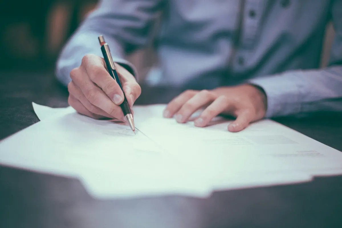 A planning notebook and pen on a desk, ready for a consultation